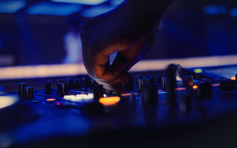 Close-up of a dimly lit private room set up for a small group